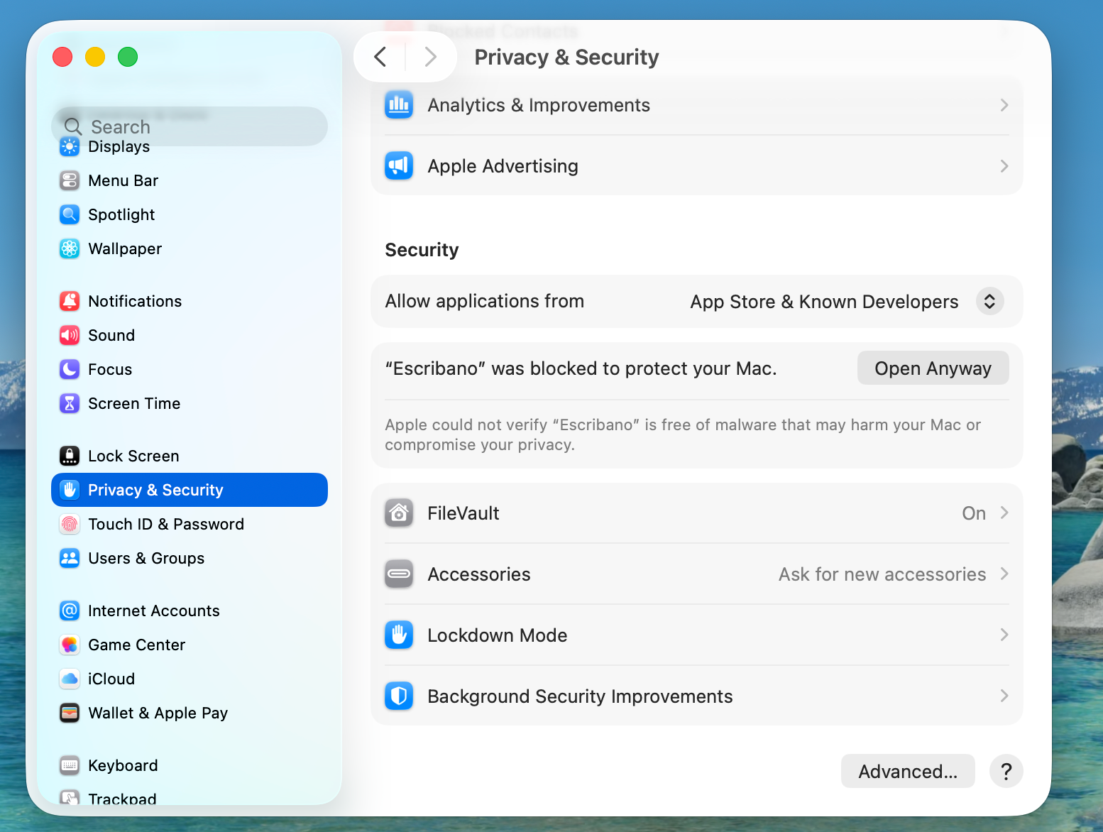 Privacy & Security panel showing "Escribano was blocked" row with an Open Anyway button